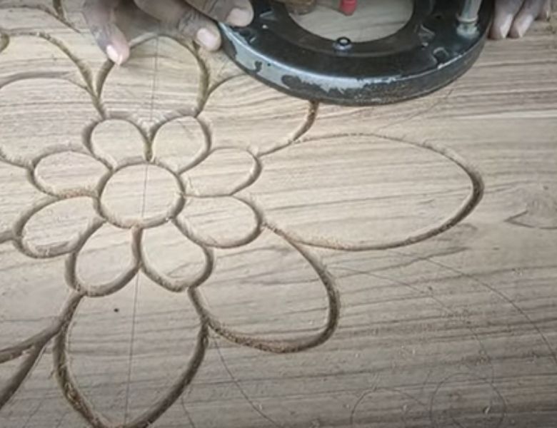 Carving designs in wood with a router'